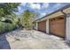 Spacious two car garage with two separate doors and large driveway at 612 Golden Dawn, Apopka, FL 32712