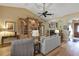 Spacious living room with wood floors, fireplace, and built-in shelving at 612 Golden Dawn, Apopka, FL 32712
