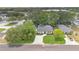 Charming home with a well-manicured front yard and a spacious driveway, surrounded by lush trees in a quiet neighborhood at 708 S Laurel Ave, Sanford, FL 32771