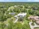 Wonderful aerial view of the home's well-manicured lawn and surrounding landscape at 7615 Se 12Th Cir, Ocala, FL 34480
