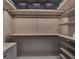 Custom closet featuring extensive shelving and storage providing ample space at 7615 Se 12Th Cir, Ocala, FL 34480