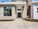 Striking front entrance with stone accents and a modern double door at 7615 Se 12Th Cir, Ocala, FL 34480