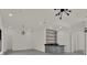 Open-concept living space with wet bar, modern lighting, and seamless flow at 7615 Se 12Th Cir, Ocala, FL 34480