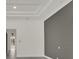 Open concept living room showcasing tray ceilings and wall color at 7615 Se 12Th Cir, Ocala, FL 34480