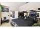 This bedroom features unique decorations and a large mirrored headboard at 7618 Majestic Pine Ct, Orlando, FL 32819