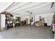 A spacious garage offers ample storage and organization space for vehicles, tools, and equipment at 7618 Majestic Pine Ct, Orlando, FL 32819