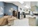 Well-lit kitchen with breakfast nook, featuring stainless steel appliances and ample counter space at 7618 Majestic Pine Ct, Orlando, FL 32819