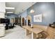 Open-concept living area with vaulted ceilings, a breakfast nook, and views into the connected rooms at 7618 Majestic Pine Ct, Orlando, FL 32819