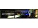 Beautiful screened-in pool with clear blue water and underwater lighting at night at 7618 Majestic Pine Ct, Orlando, FL 32819