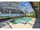 Enjoy this screened-in pool with a covered patio and plenty of space to lounge at 7618 Majestic Pine Ct, Orlando, FL 32819