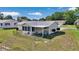 A great backyard with a screened in porch and well maintained lawn at 8443 Sw 109Th Pl, Ocala, FL 34481