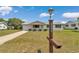 Charming single-story home with a well-maintained lawn and inviting front porch at 8443 Sw 109Th Pl, Ocala, FL 34481