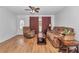 Comfortable living room with hardwood floors and neutral décor at 8443 Sw 109Th Pl, Ocala, FL 34481