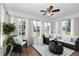 Cozy living room with comfortable seating and bright natural lighting at 8443 Sw 109Th Pl, Ocala, FL 34481