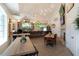 Cozy restaurant with a bar, varied seating options, and modern lighting at 8443 Sw 109Th Pl, Ocala, FL 34481