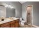 Bathroom featuring a walk-in shower and a wooden vanity with natural light at 8475 Eagles Loop Cir, Windermere, FL 34786