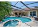 Sparkling pool features a jacuzzi and seating area, perfect for relaxing outdoors at 8475 Eagles Loop Cir, Windermere, FL 34786