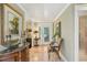 Inviting foyer with tile flooring, decorative lighting, and elegant furnishings at 98 Wisteria Dr, Longwood, FL 32779