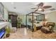 Comfortable main bedroom featuring a decorative fan, furniture and natural light at 98 Wisteria Dr, Longwood, FL 32779