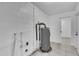 The basement area features white walls and tile floors at 107 Thrush Ln, Casselberry, FL 32707