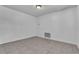 Small bedroom featuring tile floors, white walls, and an overhead light fixture at 107 Thrush Ln, Casselberry, FL 32707