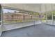 Enclosed patio with screen and fence views providing a relaxing outdoor space at 107 Thrush Ln, Casselberry, FL 32707