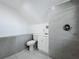 Modern bathroom with a sleek tiled shower, toilet, and vanity at 1082 Hamilton Ave, Longwood, FL 32750