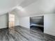 View of a bedroom including the closet and entryway with an open doorway at 1082 Hamilton Ave, Longwood, FL 32750