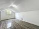 Light-filled room with wood-look floors and natural light at 1082 Hamilton Ave, Longwood, FL 32750