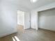 Bright bedroom features a window and a large closet at 1082 Hamilton Ave, Longwood, FL 32750