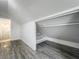 Spacious bedroom showing a walk in closet with shelves at 1082 Hamilton Ave, Longwood, FL 32750