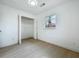 Bright bedroom features a closet and window view to the outdoors at 1082 Hamilton Ave, Longwood, FL 32750