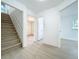 Hallway with stairway shows great access to other rooms in the home at 1082 Hamilton Ave, Longwood, FL 32750