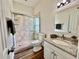 Bathroom with granite vanity and glass shower stall at 11725 Cuxham Dr, Orlando, FL 32837