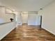 Spacious living room showcasing wood-look flooring and an open layout design at 11725 Cuxham Dr, Orlando, FL 32837
