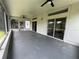 Large screened porch with sliding glass doors, offering a comfortable and bug-free outdoor space at 11725 Cuxham Dr, Orlando, FL 32837