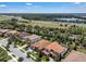 Desirable neighborhood location with mature landscaping, tile roofs, and proximity to the highway at 11741 Savona Way, Orlando, FL 32827