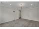 Bright, neutral bedroom with plush carpeting and tray ceiling at 11741 Savona Way, Orlando, FL 32827