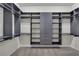 Custom walk-in closet with built-in shelving and drawers for optimal storage and organization at 11741 Savona Way, Orlando, FL 32827