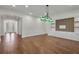 Bright living room showcasing hardwood floors and open floor plan at 11741 Savona Way, Orlando, FL 32827