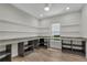 Spacious pantry featuring granite countertops, abundant shelving, and convenient storage solutions at 11741 Savona Way, Orlando, FL 32827
