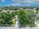 Enjoy a lush green space with mature trees in a quiet neighborhood from this home's aerial view at 1181 Welch Hill Cir, Apopka, FL 32712