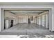 Spacious garage with shelving and decorative concrete flooring at 1181 Welch Hill Cir, Apopka, FL 32712