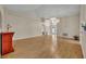 Bright living space boasts high ceilings, a modern light fixture, and a view towards the front entryway at 1181 Welch Hill Cir, Apopka, FL 32712