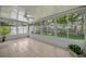 Sunroom featuring tile flooring and large windows for ample natural light at 1181 Welch Hill Cir, Apopka, FL 32712