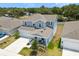 Charming two-story home with a covered porch, well-manicured landscaping, and an attached two-car garage at 1209 Deepwater Cir, Eagle Lake, FL 33839