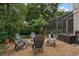 Beautiful backyard featuring a fire pit area and outdoor seating, perfect for entertaining guests at 1245 Reagans Reserve Blvd, Apopka, FL 32712