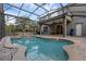 Large backyard pool with a covered lanai and brick pavers; perfect for entertaining at 1245 Reagans Reserve Blvd, Apopka, FL 32712