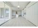 Kitchen with sliding glass doors and an island at 130 Club Villas Ln, Kissimmee, FL 34744