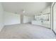 Bright and airy living room with open layout and seamless flow into the kitchen at 130 Club Villas Ln, Kissimmee, FL 34744